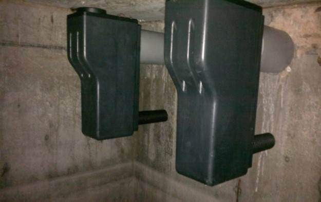 Overflow protection systems for underground concrete tanks